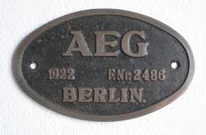 AEG 2486, 1922, Eisenguss, oval, Riffelgrund mit Rand, von