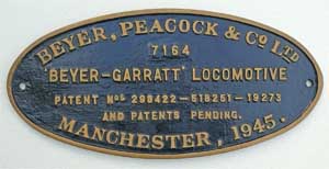 Fabrikschild Beyer, Peacock & Co Ltd., Manchester: Fabriknummer: 7164, Baujahr: 1945. Messingguss oval, glatt mit Rand. BxH= 215 x 135 mm. Das Schild ist von .