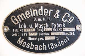 Fabrikschild Gmeinder G.m.b.H., Mosbach. Fabriknummer: 4789, Baujahr: 1953. Aluminiumguss oval, Riffelgrund mit Rand. Das Schild ist von der DB Kf-6160, sptere 323-491-1. BxH =  225 x 150 mm.