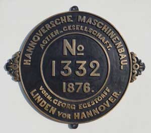 Fabrikschild Hanomag, Fabriknummer: 1332, Baujahr: 1876, Messingguss mit Rand