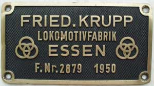 Krupp 2879, 1950, von 82 003, Messingguss, oval, Riffelgrund mit Rand, Zylinderschild