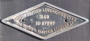 Fabrikschild North-British-Locomotive Co. Ltd (LBC) und The General Elecztric Company (GEC). Fabriknummer: 27867, Baujahr: 1959. Aluminiumguss, rautenfrmig, glatt mit Rand. BxH = 355 x 152 mm.  Das Schild ist von einer Lok aus dem ersten Grodieselversuch in Grobritannien mit MAN Motoren. Die Loks standen mehr als sie fuhren.