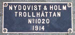 Nydqvist&Holm 1020, 1914, Messingguss, rechteckig, Riffelgrund mit Rand, von
