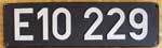 Deutschland (BRD), Lokschild der DB: E10 229, Guss-Aluminium-Groß, Frontschild. Schild mit unterschiedlichem Bögen an den Zweiern.