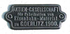 Waggonschild der Aktiengesellschaft fr Fabrikation von Eisenbahn-Material zu Goerlitz. 1900. Eisenguss mit Rand
