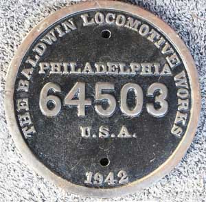Fabrikschild Baldwin: Fabriknummer: 64503, Baujahr: 1942. Messingguss rund, glatt mit Rand. D= 236 mm. Das Schild ist von der TCDD 46.213, No. 1000 of Middle East war loco department.