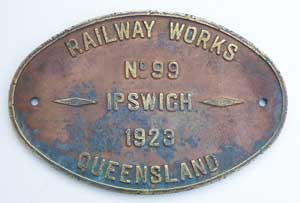 Land = ?, Fabrikschild Railway Works, Ipswich, Queenland: Fabriknummer: 99, Baujahr: 1923. Messingguss mit Rand (GMsmR). BxH = 380 x 255 mm.
