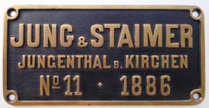 Fabrikschild Jung & Staimer, Jungenthal bei Kirchen. Fabriknummer: 11, Baujahr: 1886. Messingguss rechteckig, Riffelgrund mit Rand. BxH = x mm. Das schöne Fabrikschild ist von einer Bn2t, 1435mm, Gaswerk Rotterdam.