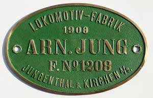 Fabrikschild Jung, Jungenthal. Fabriknummer: 1208, Baujahr: 1908. Messingguss oval, Riffelgrund mit Rand (GMsmR). Das Schild ist von einer 1D, 1050 mm der Chemin de Fer du Hedjas, Lok 67.