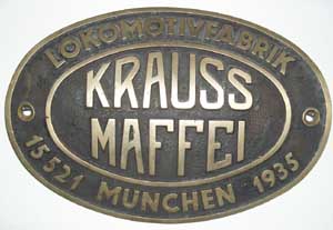 Krauss-Maffei 15521, 1935, Messingguss, Riffelgrund mit Rand, von Baureihe 64 358, Zylinderschild
