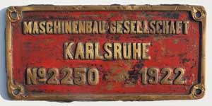 Fabrikschild Maschinenbau-Gesellschaft Karlsruhe, Fabriknummer: 2250, Baujahr: 1922. Messingguss rechteckig, glatt mit Rand. Das Schild ist von einer 1C1h4 der SHS (Eisenbahnen des Knigreichs der Serben, Kroaten und Slowenen) JD 01-088.