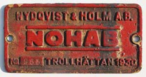 Fabrikschild Nohab, (Nydqvist&Holm A.B.), Trollhttan. Fabriknummer: 965, Baujahr: 1930. Messingguss rechteckig, Riffelgrund mit Rand. Das Schild ist von der ?