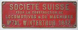 Fabrikschild Societ� SLM. Fabriknummer: 731, Baujahr: 1892. Messingguss rechteckig, Riffelgrund mit Rand. BxH =&nbsp;380 x&nbsp;135 mm. Das Schild ist von der VR, Klasse 1C.