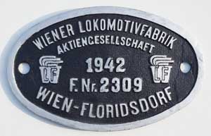 Fabrikschild Wiener Lokomotivfabrik Aktiengesellschaft, Wien-Floridsdorf. Fabriknummer: 2309, Baujahr: 1942, Zinkguss, oval, Riffelgrund mit Rand. Das Schild ist ein Tenderschild von einer DRB 44er.
