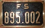 Lokschild der F.S.: 895.002, Messingguss rechteckig, Riffelgrund mit Rand. BxH = 312 x 191 mm.