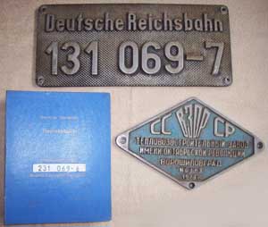 Lokschild 131 069-7, Aluguss, Riffelgrund mit Betriebsbuch und Fabrikschild CCCP Woroschilograd 183, 1973