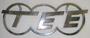 TEE-Logo, Messing-Hohlguss, verchromt, 5-teilig
